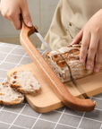 Simmr.™ Bowed Bread Knife