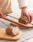 Simmr.™ Bowed Bread Knife